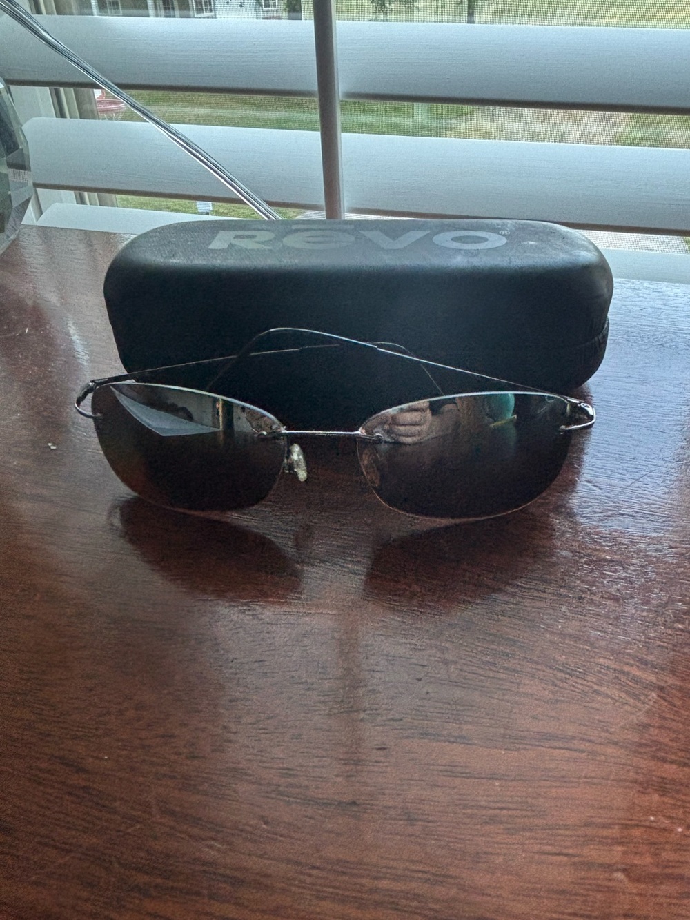 Revo Aviator Sunglasses with Dark Brown Lenses and Silver Frame